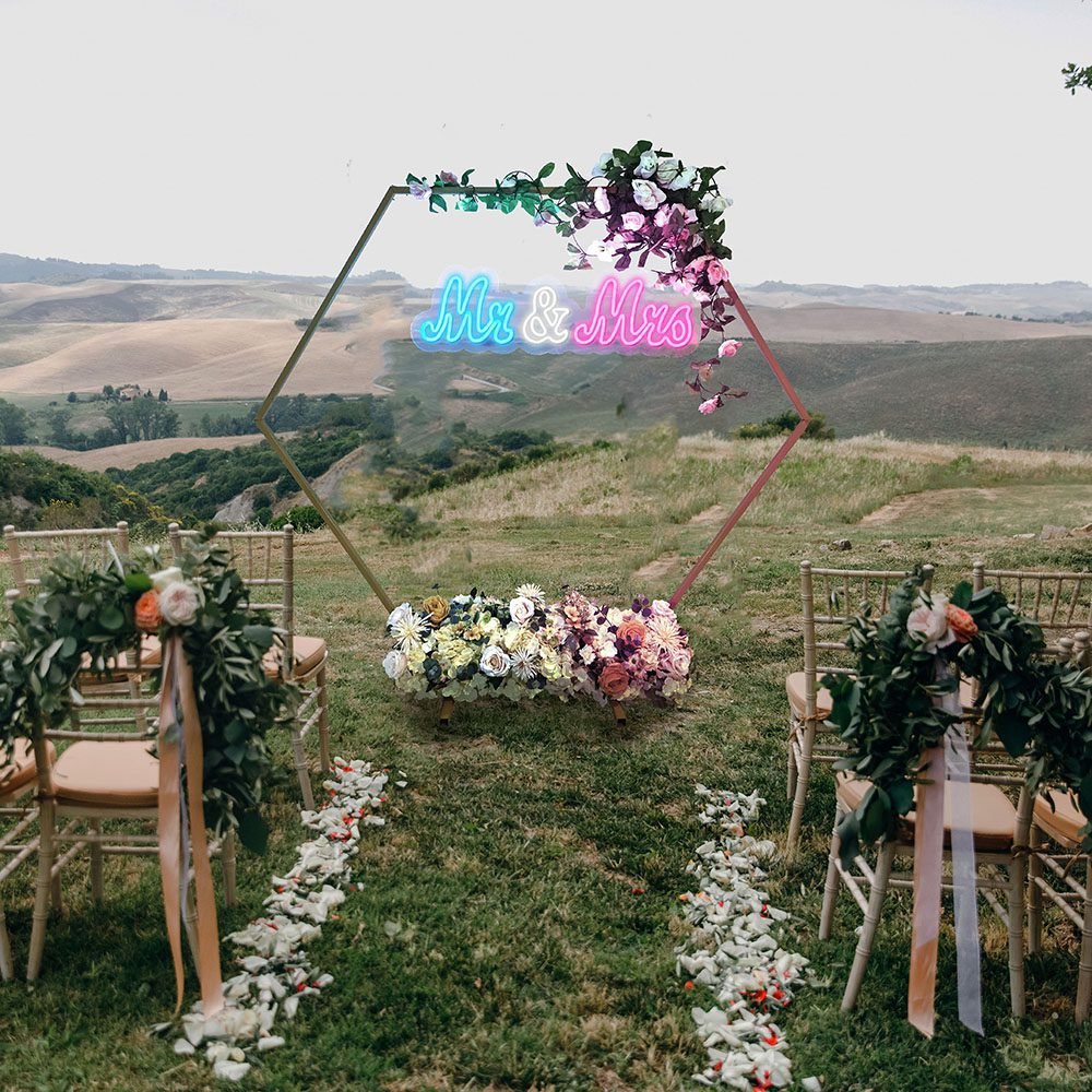 Italian wedding decoration. Green eucalyptus, oranges and pink f